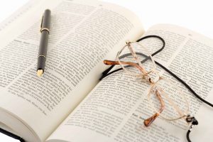 Image of book representing grant consulting services evaluation and reporting tools